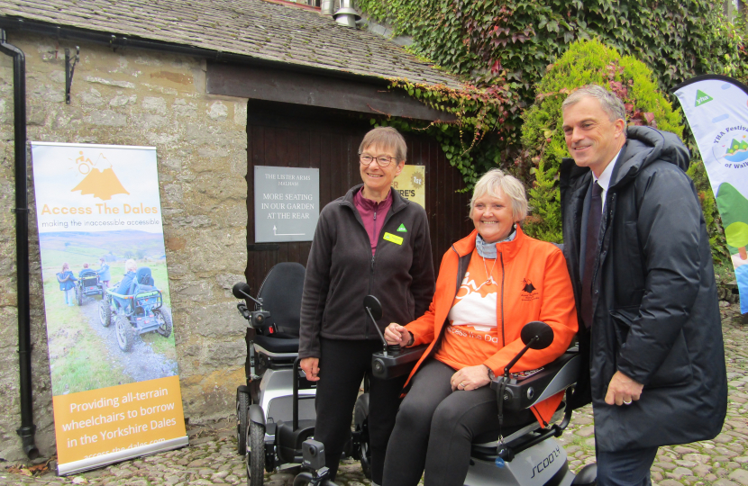 Julian pictured with Debbie North and chair of the YHA