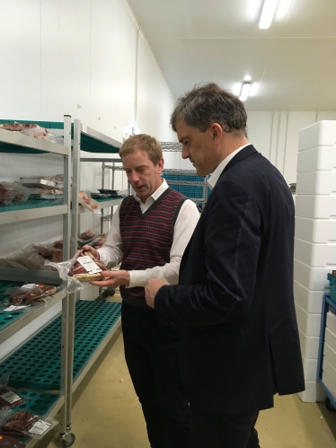 Julian Smith being shown Farmison's famous meat